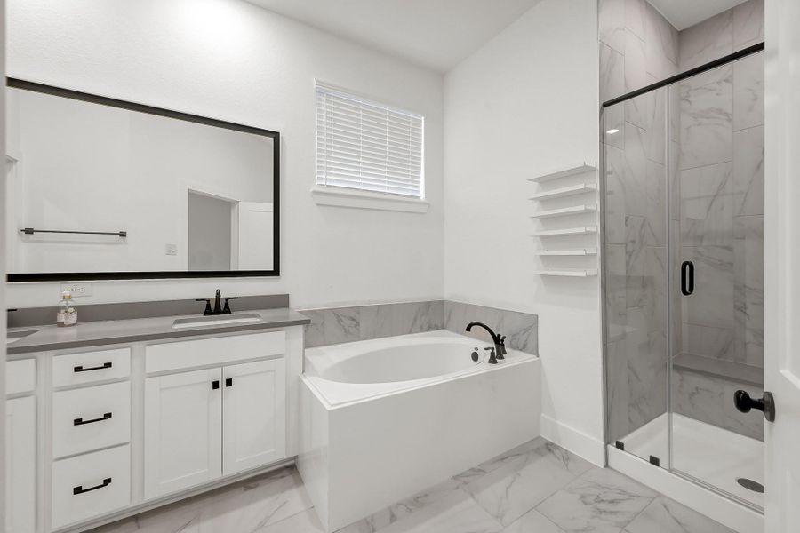 Furnished interior view inside a new home in The Woodland Hills 50', Willis (Image 9). Furnished interior view inside a new home in The Woodland Hills 50', Willis (Image 9).