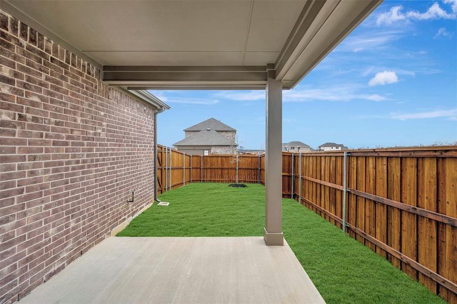 Exterior details and patio area of a home in Lilybrooke at Legacy Hills, Celina (Image 3).