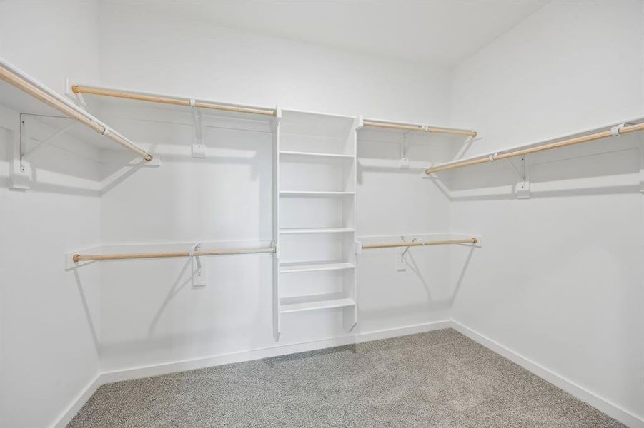 Primary Closet in the Mesquite home plan by Trophy Signature Homes – REPRESENTATIVE PHOTO Primary Closet in the Mesquite home plan by Trophy Signature Homes – REPRESENTATIVE PHOTO