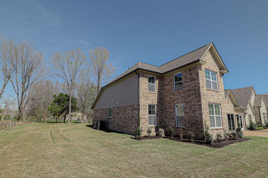 Representative exterior photo of a completed home built from the Ashmont by Grant & Co in Walker Farms, Bartlett, TN (Image 25).