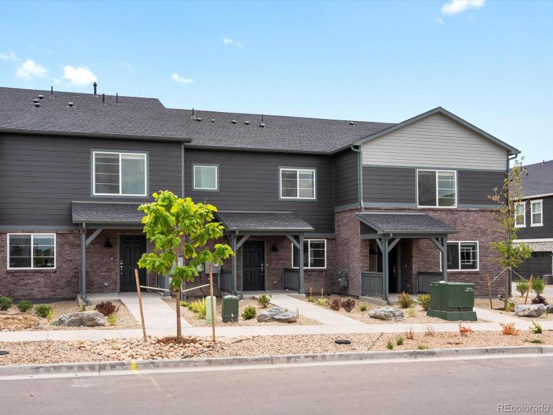 Front exterior of a new home in , Aurora, CO, highlighting curb appeal (Image 13). Front exterior of a new home in , Aurora, CO, highlighting curb appeal (Image 13).