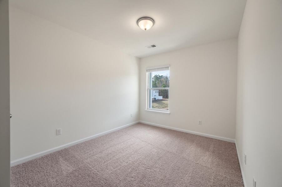 Spacious, unfurnished interior of a new home in The Landings at Montague, Goose Creek (Image 36).