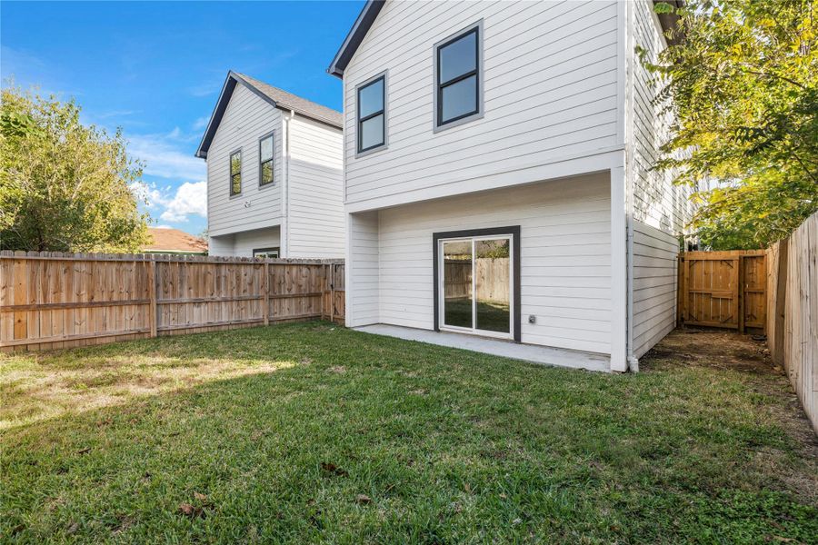 Exterior details and patio area of a home in , Houston (Image 4).