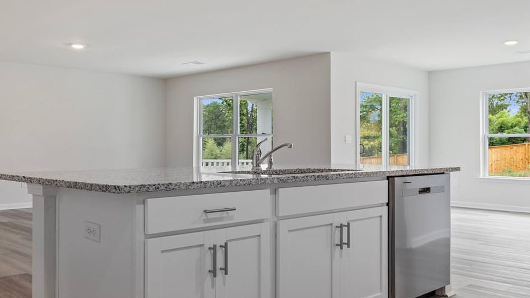 Furnished interior view inside a new home in Bentley Park, Greenwood (Image 8).