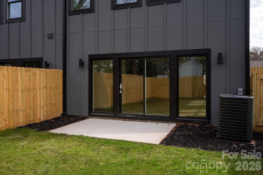 Black-Framed sliding glass doors.