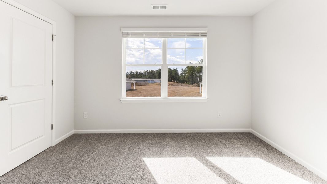Representative unfurnished interior of a home built from the HAYDEN by D.R. Horton in Sidbury Station, Castle Hayne (Image 30).