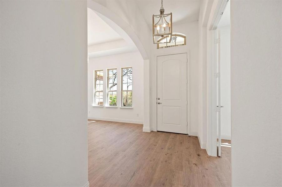 Entryway with light wood-type flooring