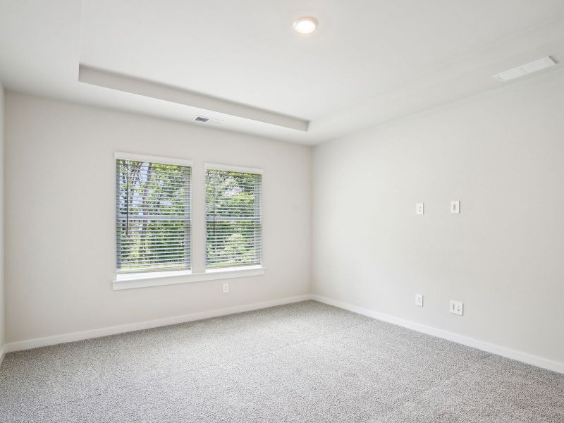 Primary suite in the Sherwood floorplan in a Meritage Homes community. Primary suite in the Sherwood floorplan in a Meritage Homes community.