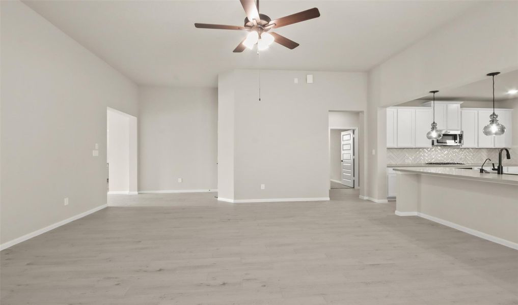 Kitchen open to great room (*Photo not of actual home and used for illustration purposes only.) Kitchen open to great room (*Photo not of actual home and used for illustration purposes only.)