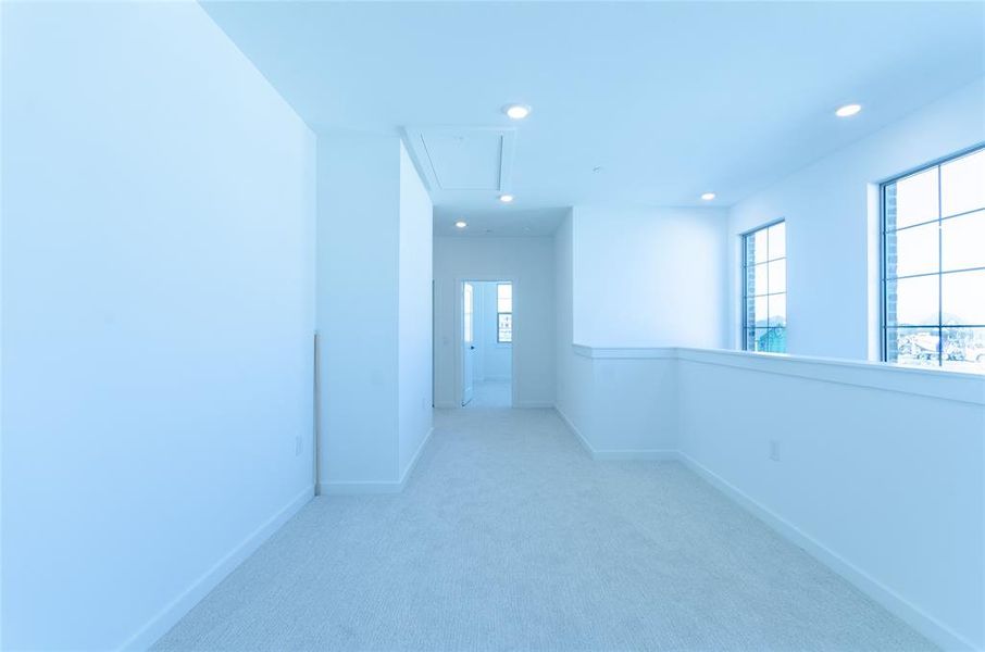 Empty room with carpet, recessed lighting, and healthy amount of natural light