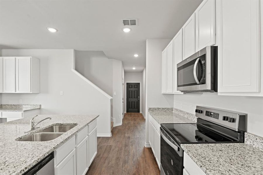 Furnished interior view inside a new home in Burgess Meadows, Cleburne (Image 6). Furnished interior view inside a new home in Burgess Meadows, Cleburne (Image 6).
