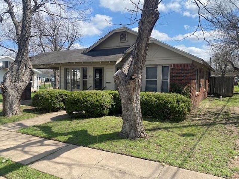 Front exterior of a new home in , Brownwood, TX, highlighting curb appeal (Image 2). Front exterior of a new home in , Brownwood, TX, highlighting curb appeal (Image 2).