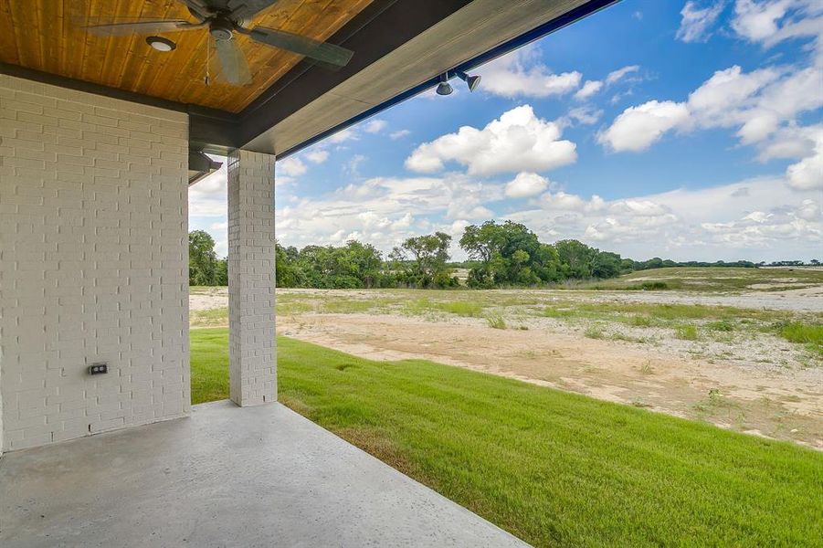 Exterior details and patio area of a home in Peaks at Lone Elm, Waxahachie (Image 21).
