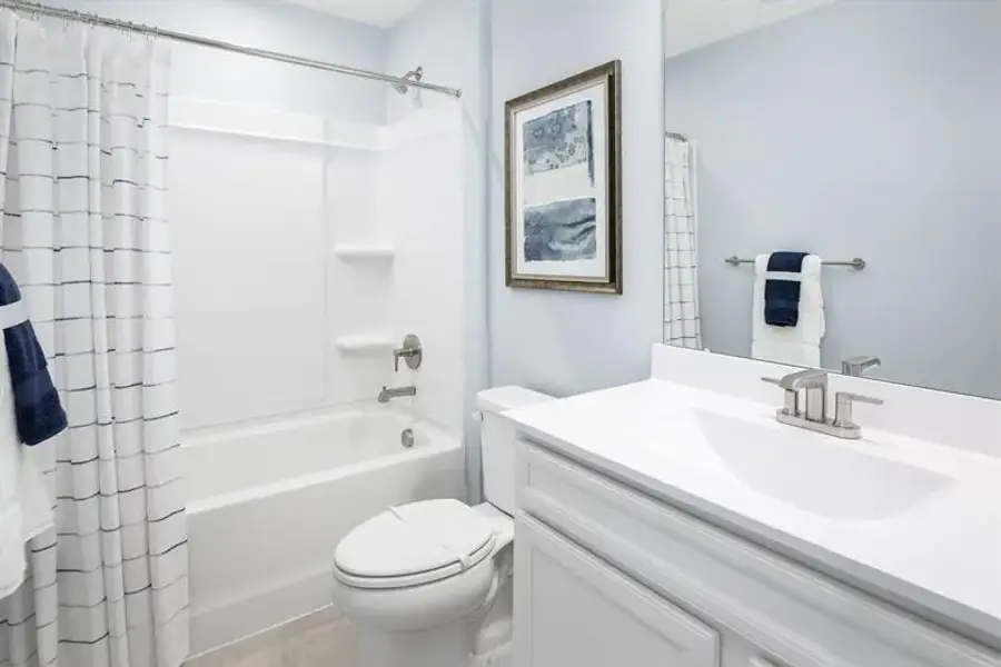 Representative furnished interior of a home built from the Nassau Cove - 3253 Edgehill Drive by Ryan Homes in Lakes at Riverbend, Navassa (Image 17).