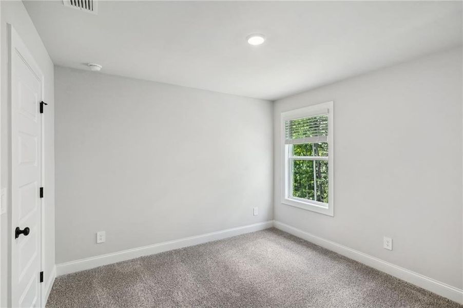 Spacious, unfurnished interior of a new home in Martin Springs - Estate Series, Lawrenceville (Image 20).