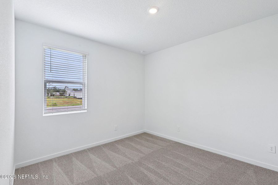 Spacious, unfurnished interior of a new home in Flagler Village - Signature Series, Palm Coast (Image 17).
