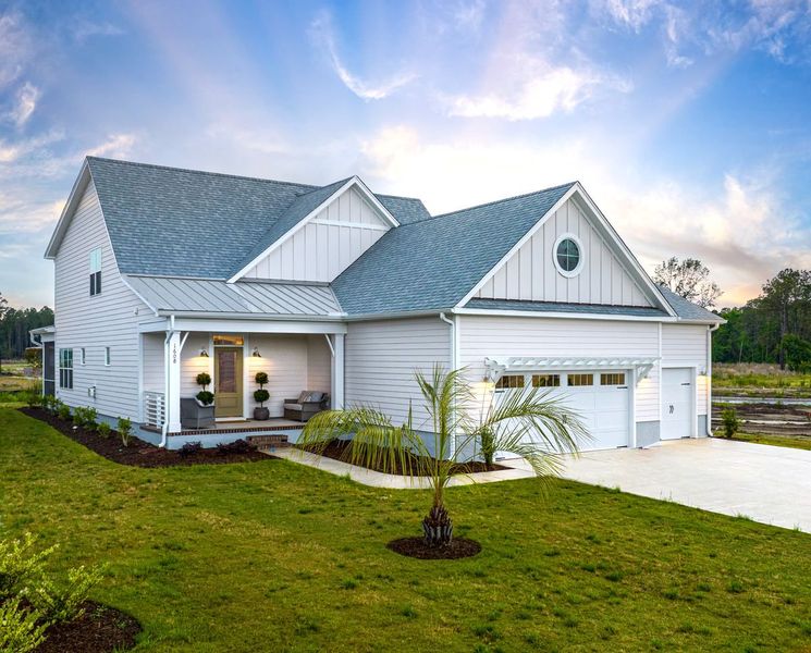 Representative exterior photo of a completed home built from the Willowbrook by Bill Clark Homes in Riverside Cove, Wilmington, NC (Image 23). Representative exterior photo of a completed home built from the Willowbrook by Bill Clark Homes in Riverside Cove, Wilmington, NC (Image 23).