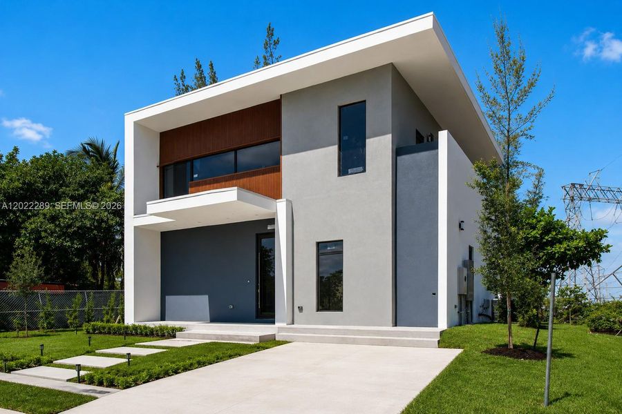 Front exterior of a new home in , Dania Beach, FL, highlighting curb appeal (Image 2). Front exterior of a new home in , Dania Beach, FL, highlighting curb appeal (Image 2).