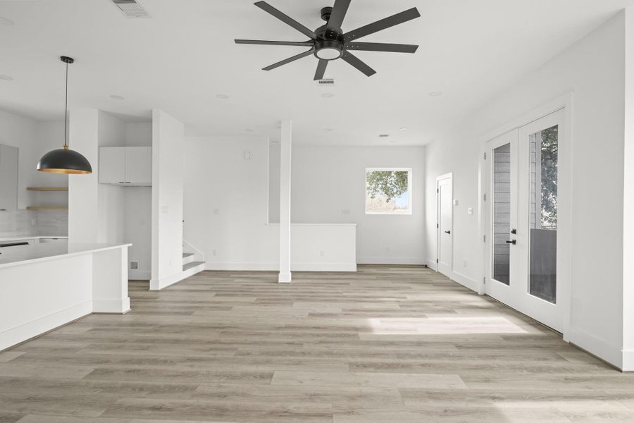 Enjoy ease of movement from one area to the next with the open living room, dining room and kitchen area. Enjoy ease of movement from one area to the next with the open living room, dining room and kitchen area.