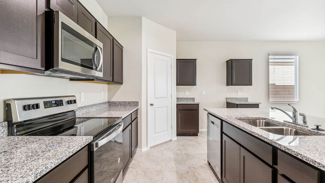 Furnished interior view inside a new home in Heartland Ranch, Coolidge (Image 8).
