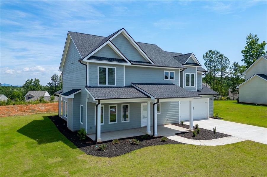 Front exterior of a new home in , Toccoa, GA, highlighting curb appeal (Image 25). Front exterior of a new home in , Toccoa, GA, highlighting curb appeal (Image 25).