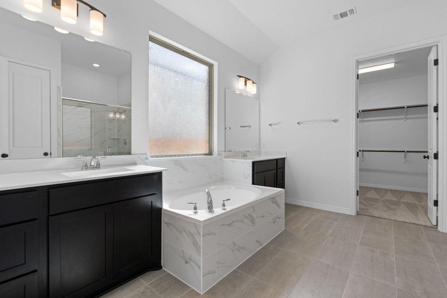Primary Bath retreat with dual vanities & garden tub