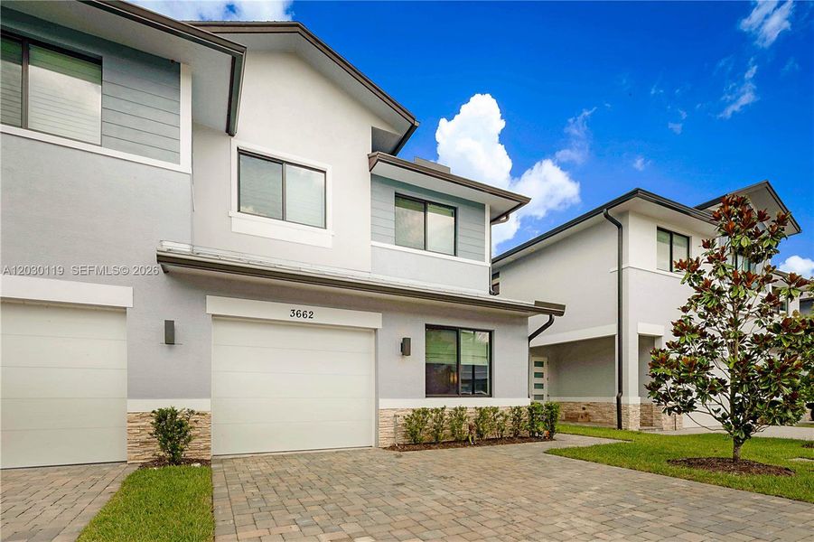 Front exterior of a new home in , Palm City, FL, highlighting curb appeal (Image 22).