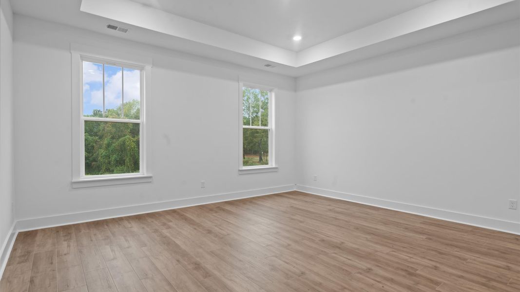 Accomplished design meets restful elegance in this exclusive primary suite by DRB Homes