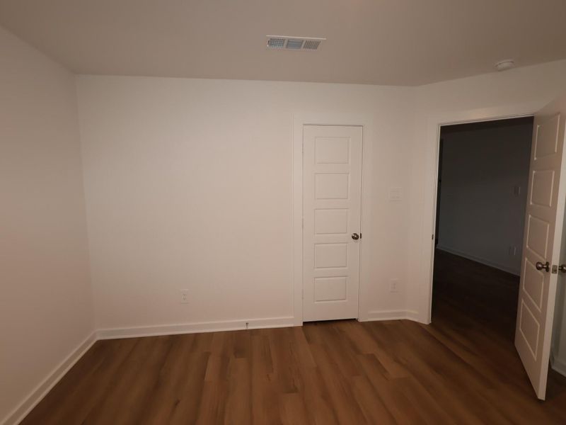 Spacious, unfurnished interior of a new home in Pinewood at Grand Texas, New Caney (Image 22).