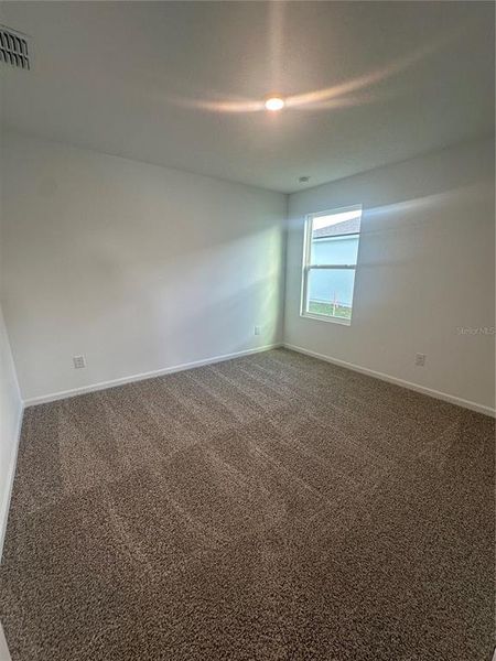 Spacious, unfurnished interior of a new home in Entrada, St. Augustine (Image 24).