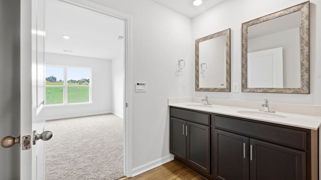 Furnished interior view inside a new home in Lakestone, Woodruff (Image 12).