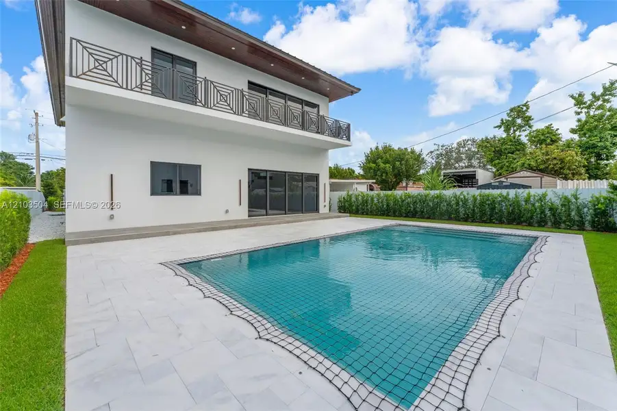 Exterior details and patio area of a home in , Miami (Image 3).
