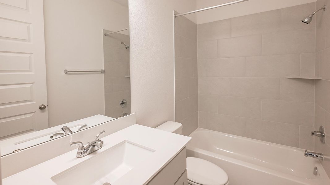 Furnished interior view inside a new home in La Cima, San Marcos (Image 11).