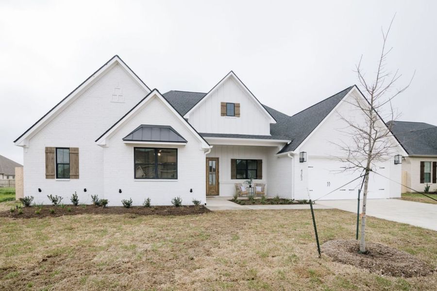 Representative exterior photo of a completed home built from the The Sophie by Reece Homes in Harvest Meadows, Bryan, TX (Image 2). Representative exterior photo of a completed home built from the The Sophie by Reece Homes in Harvest Meadows, Bryan, TX (Image 2).