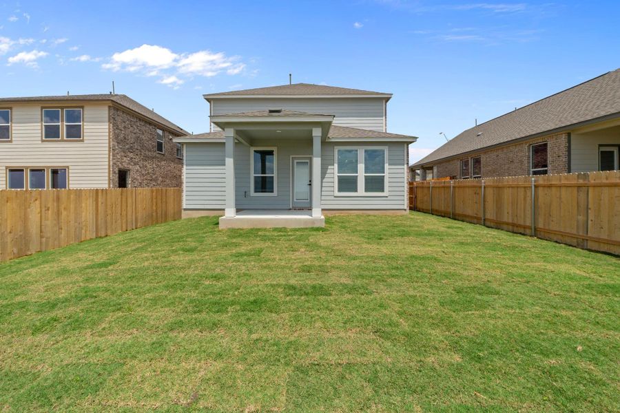Front exterior of a new home in Salerno - Heritage Collection, Round Rock, TX, highlighting curb appeal (Image 14).