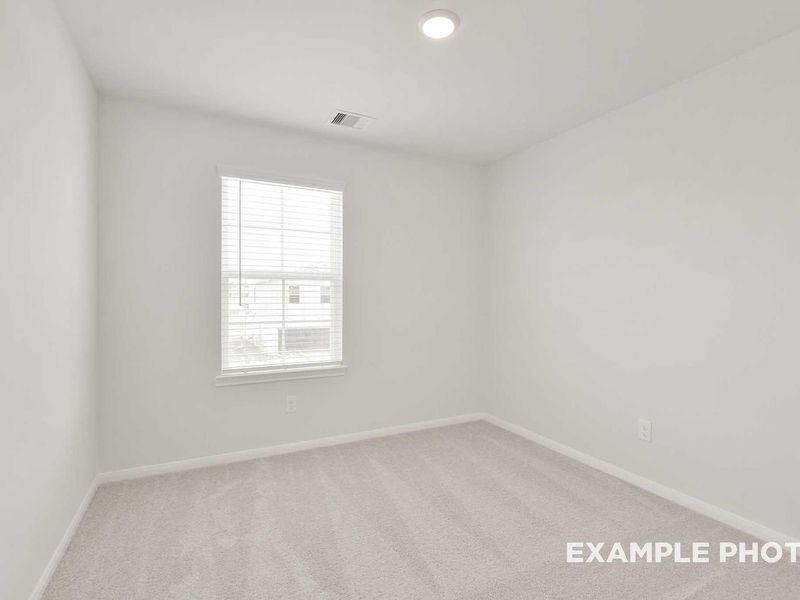 Spacious, unfurnished interior of a new home in Caney Creek Place, Conroe (Image 31).