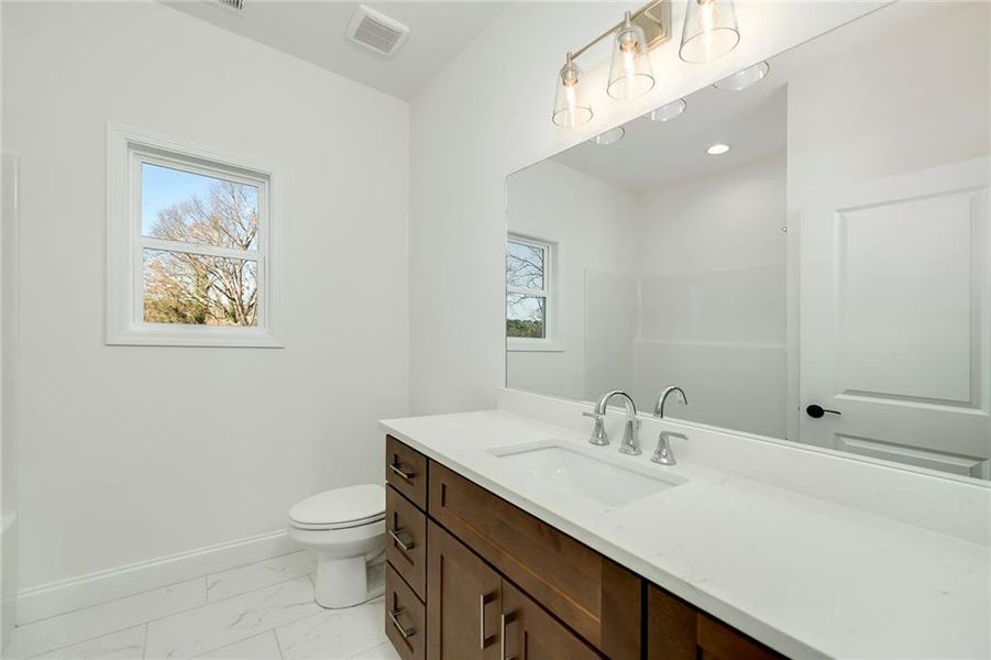 Furnished interior view inside a new home in , Buford (Image 10).