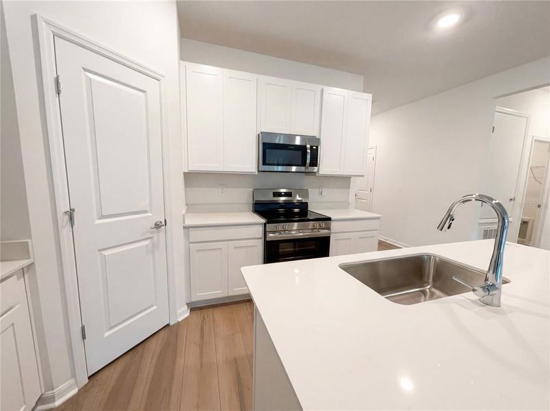 Furnished interior view inside a new home in Grand Park, Dunnellon (Image 7).