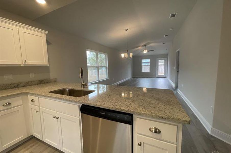 Furnished interior view inside a new home in Turtle Creek, Cantonment (Image 4).