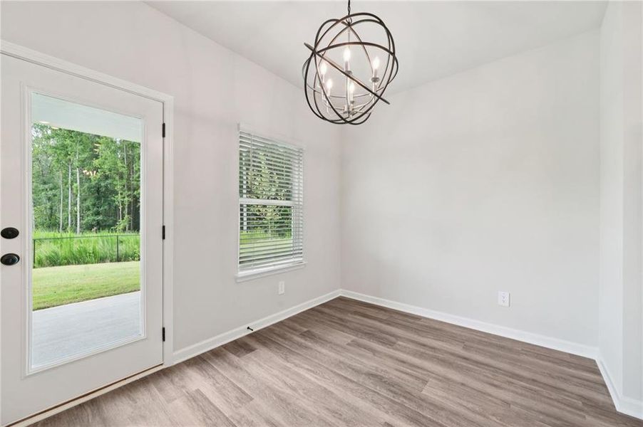 Spacious, unfurnished interior of a new home in Vines at Mill Creek - Estate Series, Braselton (Image 21).