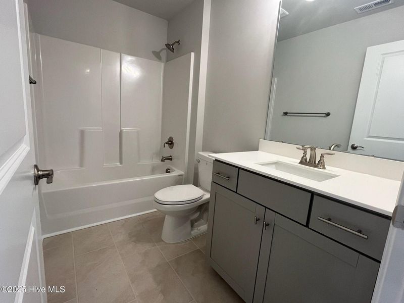 Furnished interior view inside a new home in Palmetto Creek, Bolivia (Image 15).