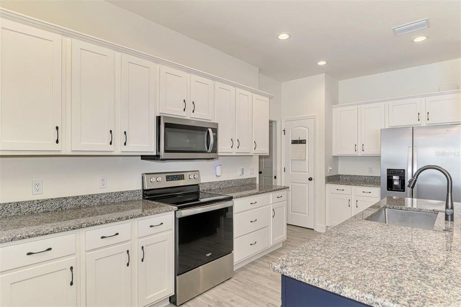 Furnished interior view inside a new home in , North Port (Image 39).