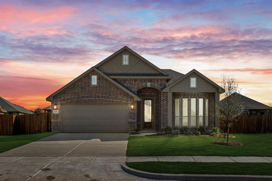 Front exterior of a new home in Sable Creek, Sanger, TX, highlighting curb appeal (Image 2). Front exterior of a new home in Sable Creek, Sanger, TX, highlighting curb appeal (Image 2).