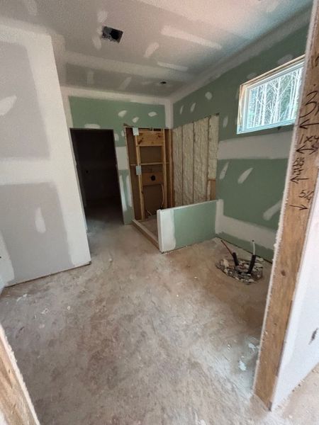 In-progress construction of a new home in White Oaks, The Rock, GA (Image 16).