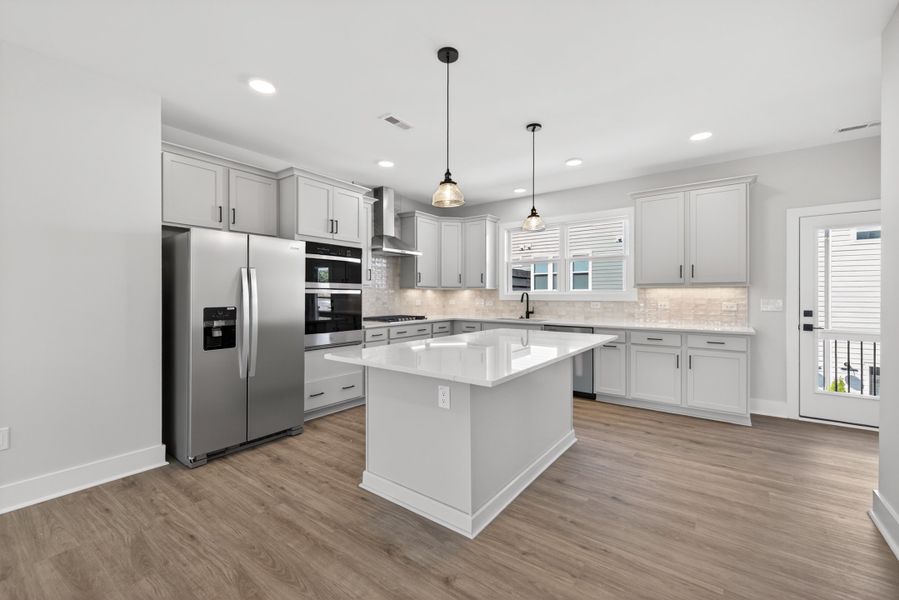 Representative furnished interior of a home built from the Atlas Interior Unit by Baker Residential in Atwater Station - Midtown Collection, Fuquay Varina (Image 10).