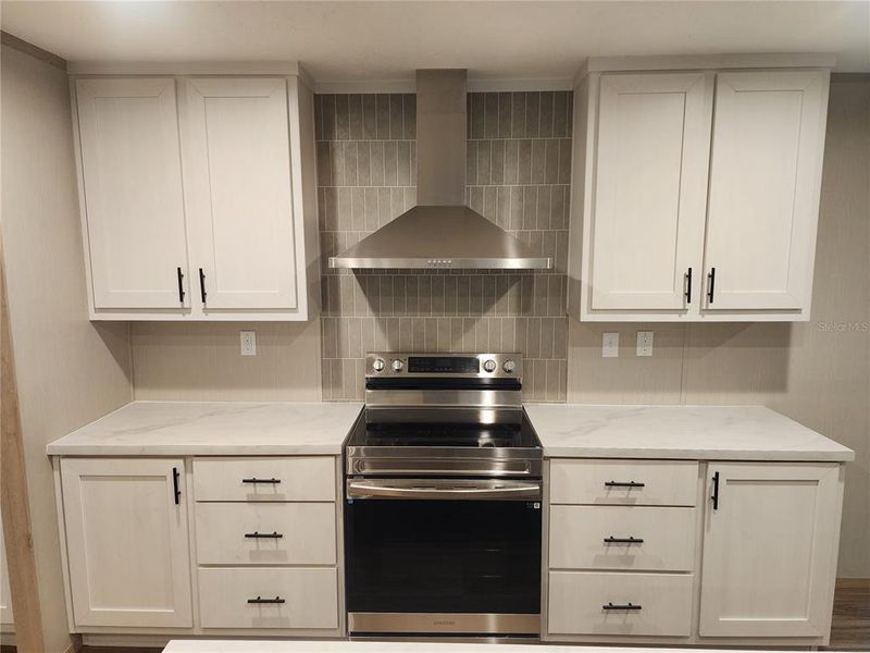 Furnished interior view inside a new home in , Dunnellon (Image 8).