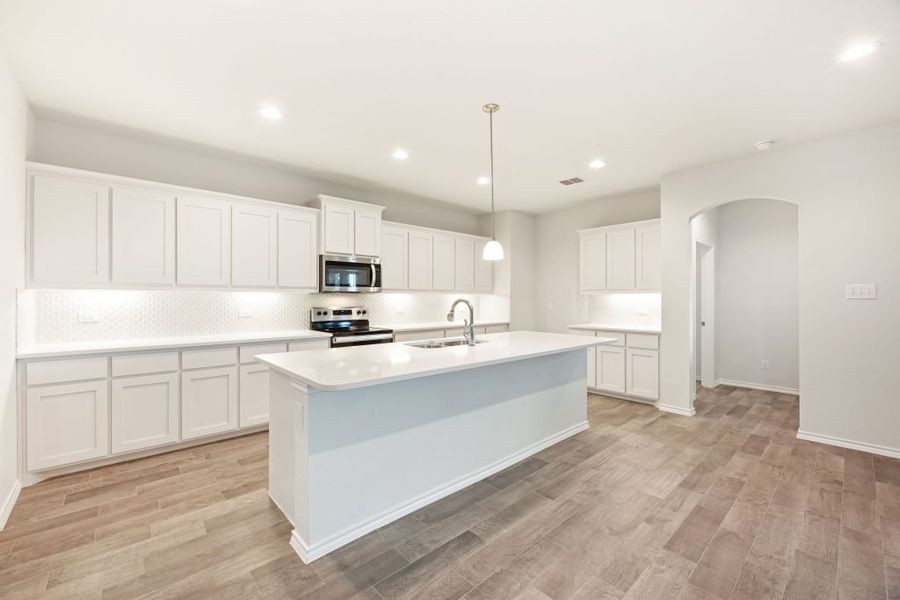 Representative exterior photo of a completed home built from the Radcliffe II by Impression Homes in Stone Eagle, Azle, TX (Image 11).