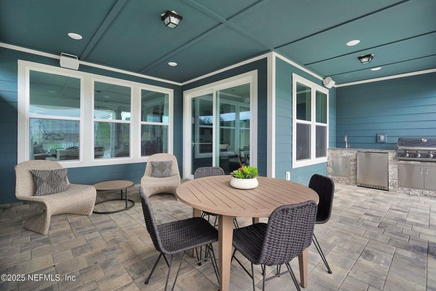Exterior details and patio area of a home in The Preserve at Bannon Lakes, St. Augustine (Image 2).