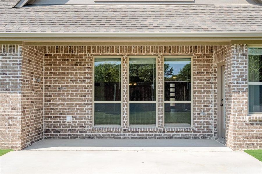 Front exterior of a new home in Villages of Walnut Grove, Midlothian, TX, highlighting curb appeal (Image 2).