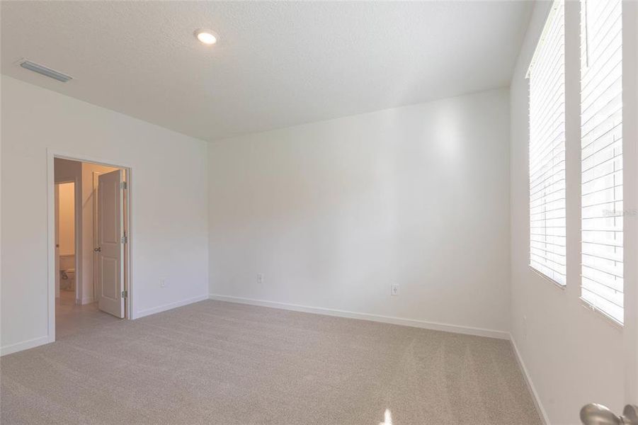 Spacious, unfurnished interior of a new home in Flagler Village - Classic Series, Palm Coast (Image 14).